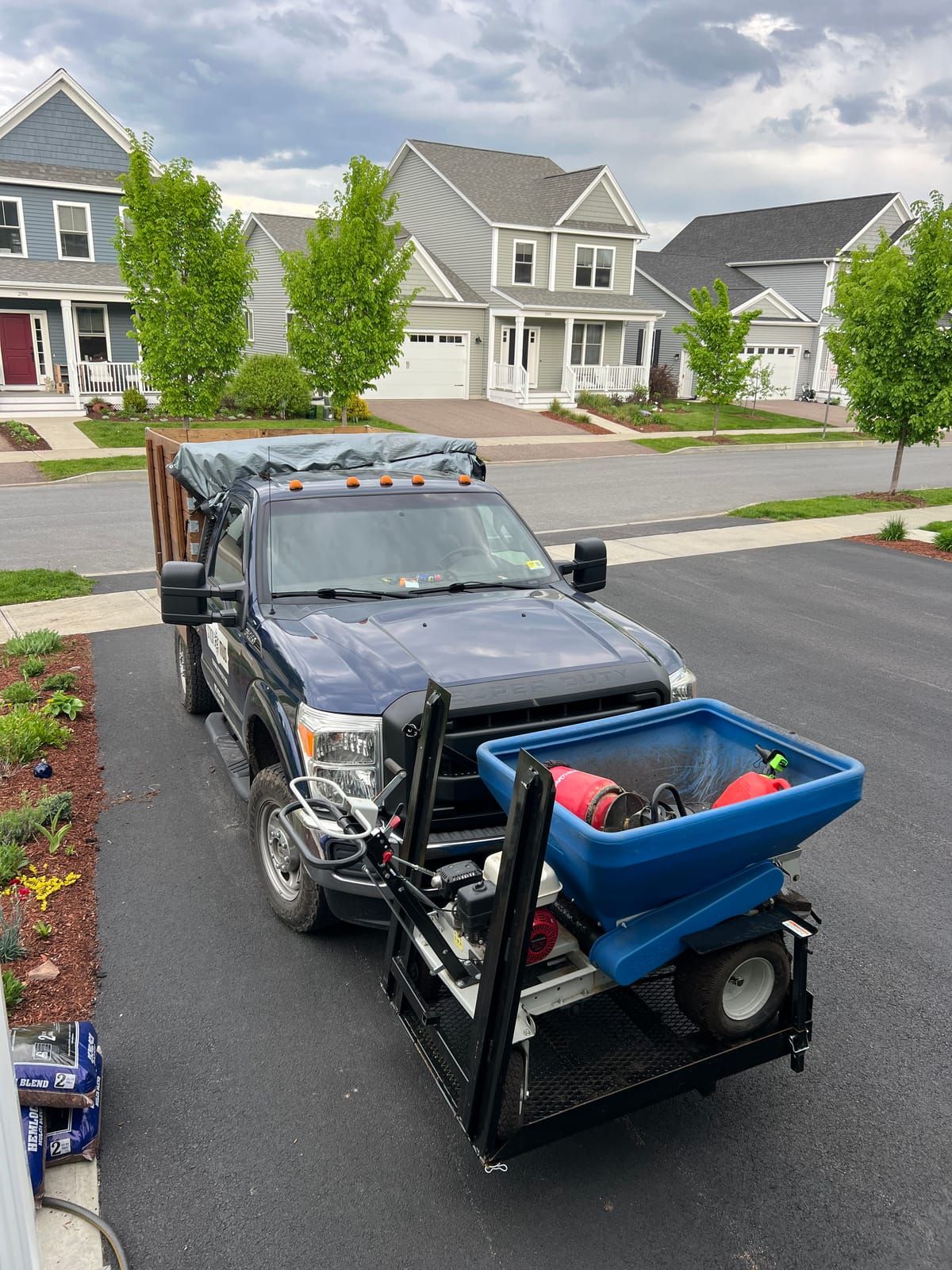 The Stick2Mud truck with the topdresser on the hitch